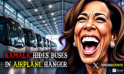 Kamala laughs at buses in airplane hanger